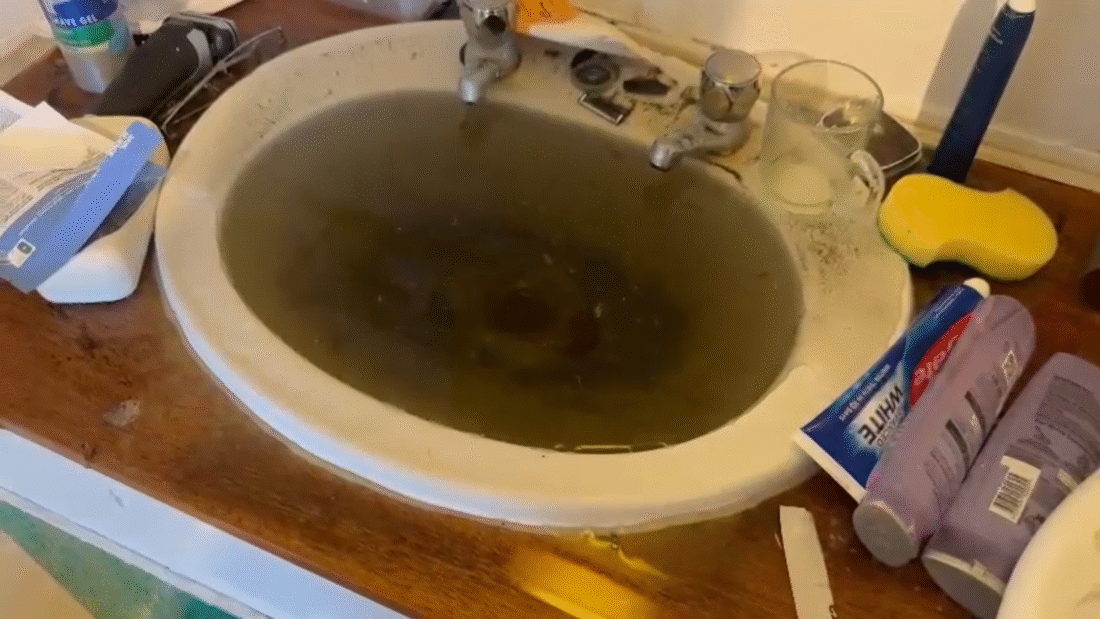 Videos show black water gushing from UCL hall sink
